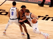 爱游戏在线-猛龙逆转山东队，东契奇带队取胜